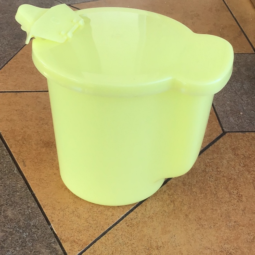 Tupperware cream pitcher.